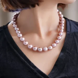 woman wearing 12mm pearl necklace ,round luster& pink color